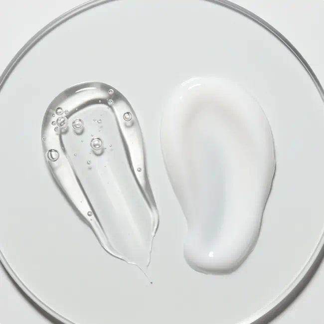 A close-up of two different textures on a white surface