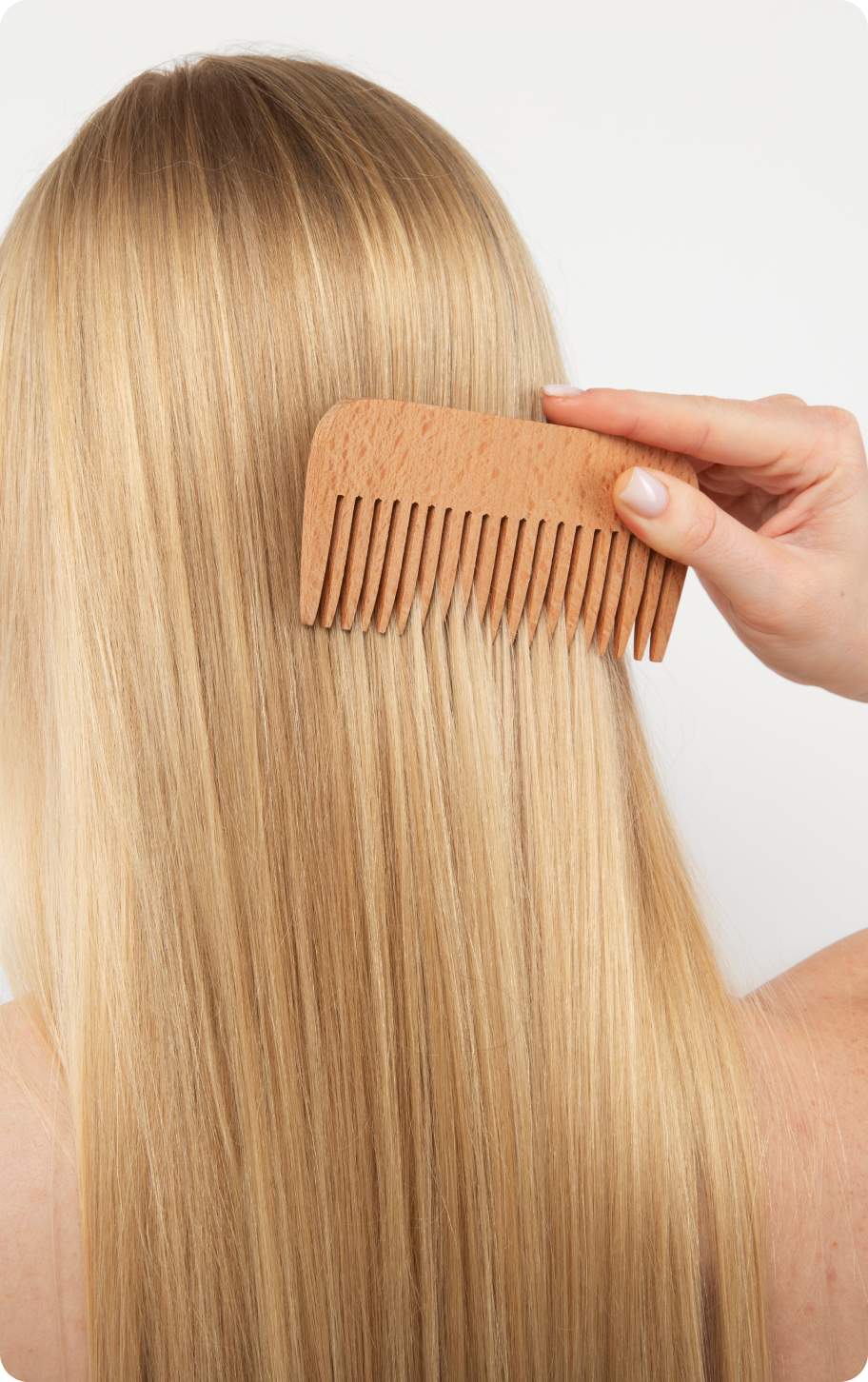 woman brushing her hair