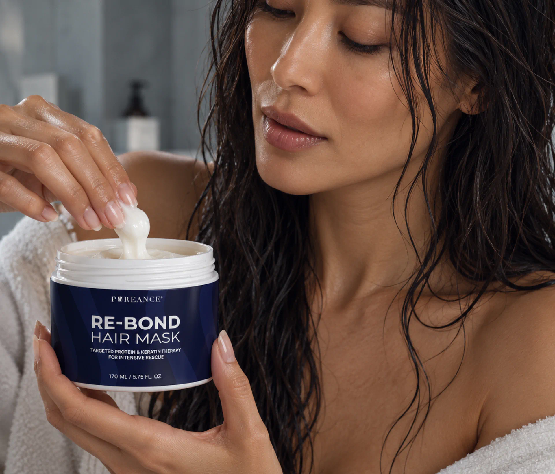 Woman with wet hair applying Pureance keratin hair mask